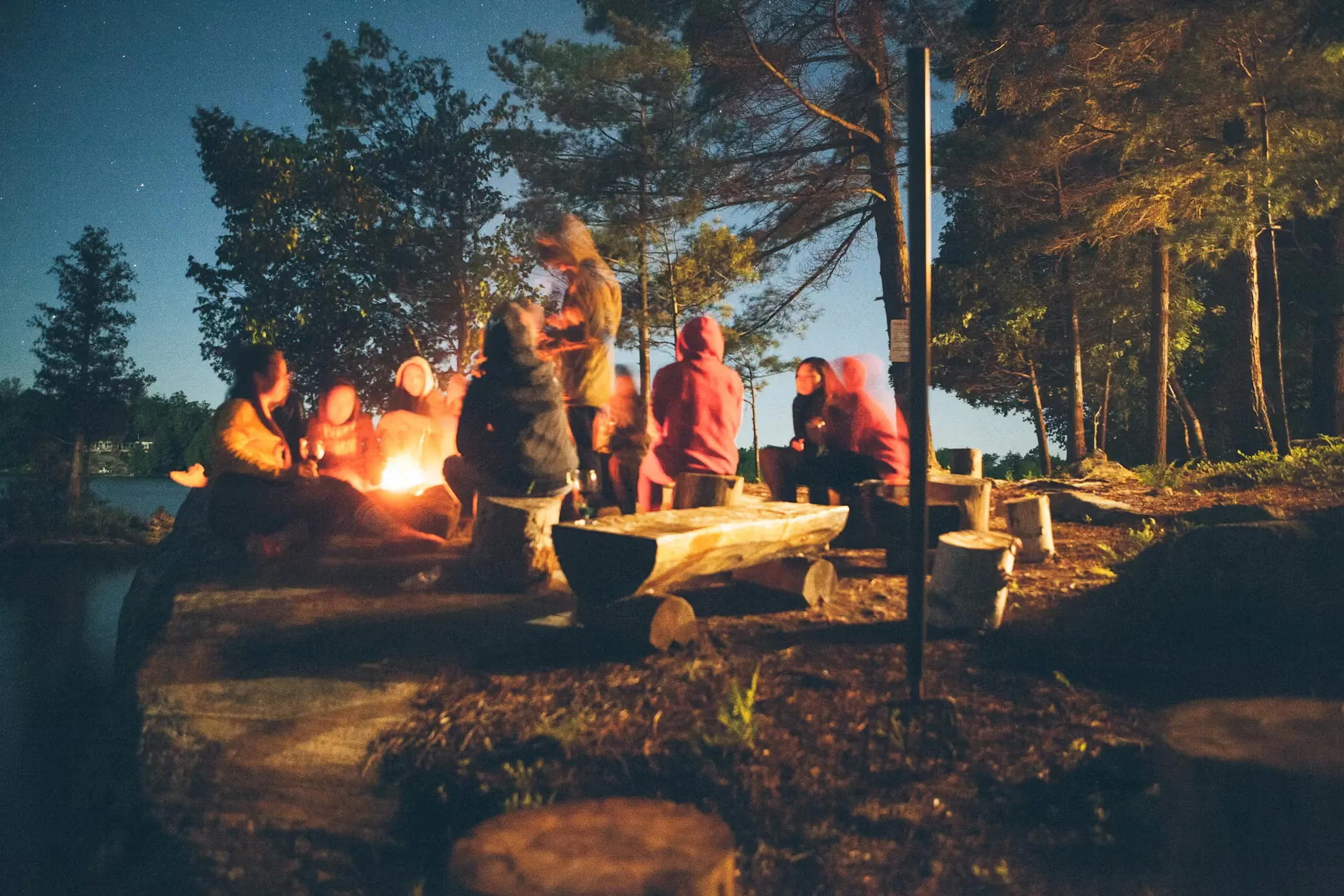 A scenic UK campsite with a tent and a view of the mountains.
